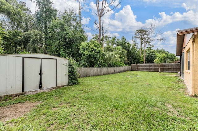 6101 Broken Arrow Dr, New Port Richey, FL 34653 - fenced backyard with a storage unit