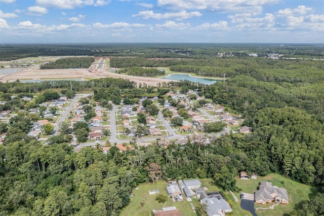 6101 Broken Arrow Dr, New Port Richey, FL 34653 - aerial overview of property's location featuring a large body of water and nearby suburban area