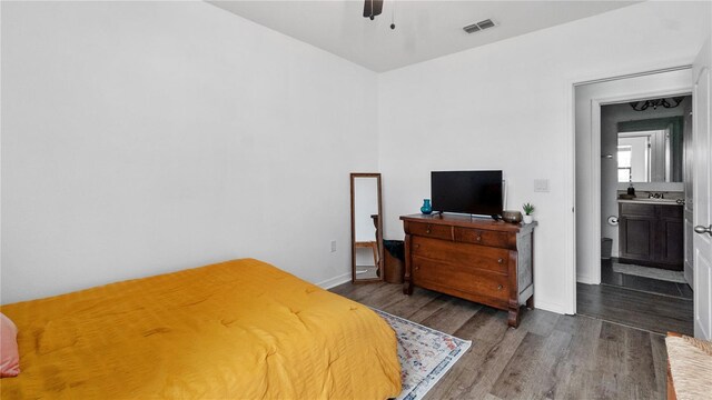 14317 Italia Dr, Wimauma, FL 33598 - bedroom featuring wood finished floors and a ceiling fan