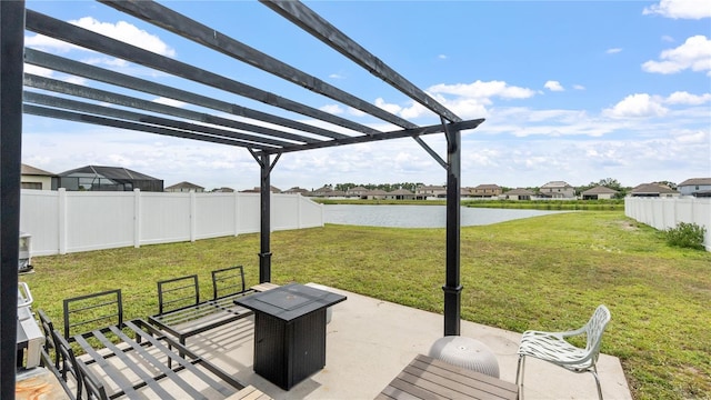 14317 Italia Dr, Wimauma, FL 33598 - view of patio / terrace with a water view, a pergola, and a residential view