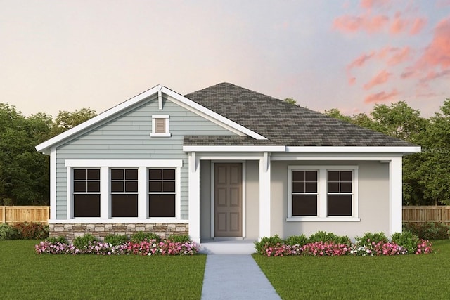 28792 Rambutan Dr, Wesley Chapel, FL 33543 - view of front of property featuring a shingled roof and stone siding