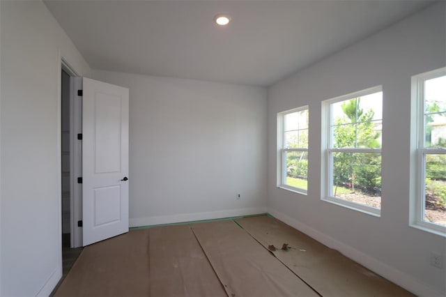 28792 Rambutan Dr, Wesley Chapel, FL 33543 - spare room featuring baseboards