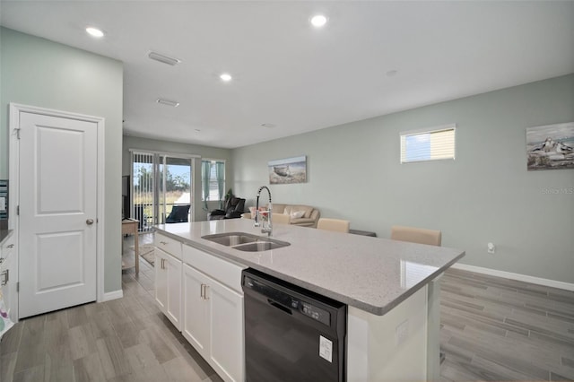 11829 Brighton Knoll Loop, Riverview, FL 33579 - kitchen featuring dishwasher, plenty of natural light, white cabinetry, light stone countertops, and recessed lighting