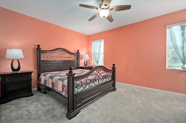 11829 Brighton Knoll Loop, Riverview, FL 33579 - bedroom with multiple windows, carpet flooring, and a ceiling fan