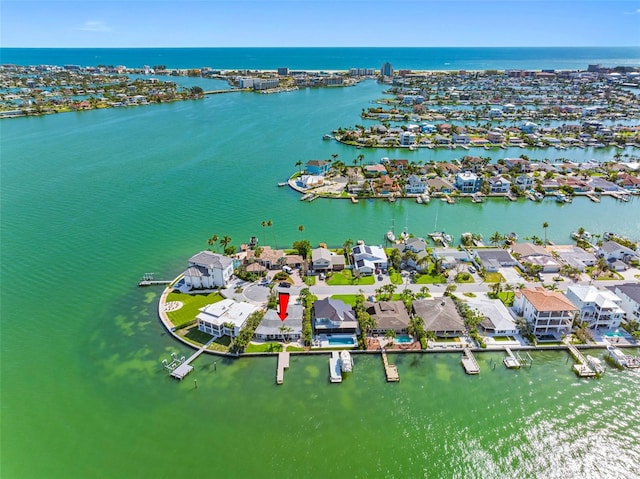 11085 9th St E, Treasure Island, FL 33706 - aerial view of residential area with a nearby body of water