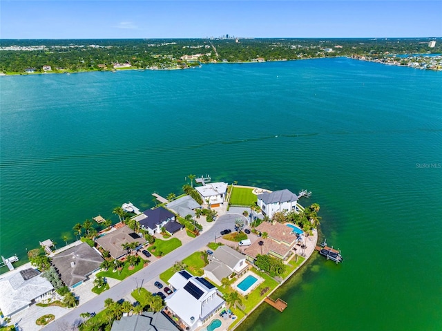 11085 9th St E, Treasure Island, FL 33706 - aerial view of residential area featuring a large body of water