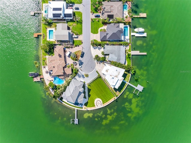 11085 9th St E, Treasure Island, FL 33706 - aerial perspective of suburban area with a nearby body of water