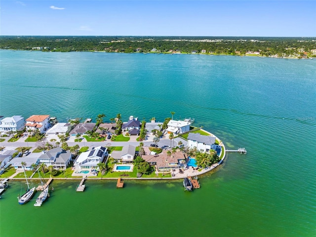 11085 9th St E, Treasure Island, FL 33706 - aerial view of residential area with a nearby body of water