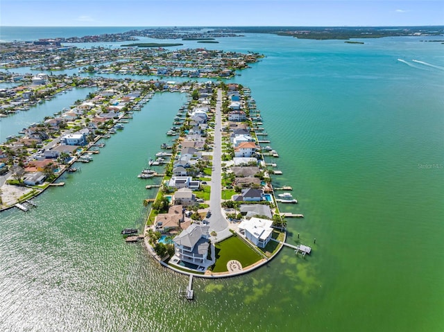 11085 9th St E, Treasure Island, FL 33706 - aerial perspective of suburban area featuring a large body of water
