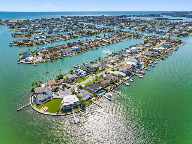 11085 9th St E, Treasure Island, FL 33706 - aerial view of residential area with a large body of water
