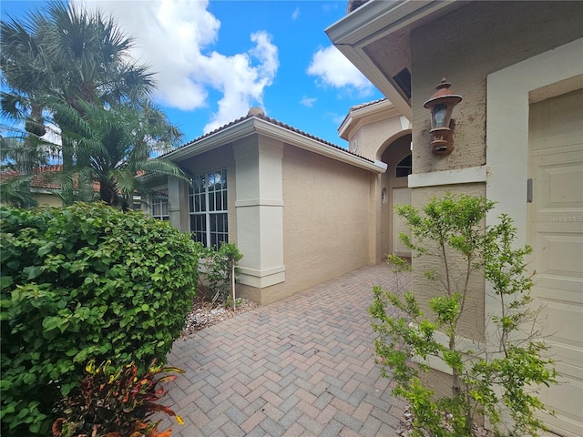 6900 Molakai Cir, Boynton Beach, FL 33437 - view of side of home featuring stucco siding