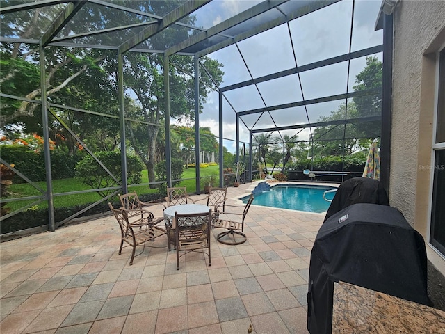 6900 Molakai Cir, Boynton Beach, FL 33437 - swimming pool featuring a patio, area for grilling, and glass enclosure