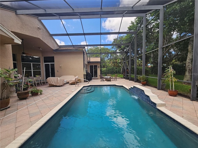6900 Molakai Cir, Boynton Beach, FL 33437 - outdoor pool with a patio, ceiling fan, and glass enclosure