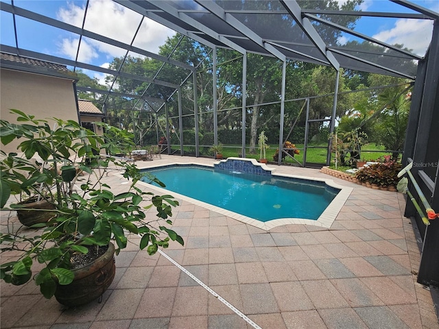 6900 Molakai Cir, Boynton Beach, FL 33437 - outdoor pool featuring a patio area and glass enclosure