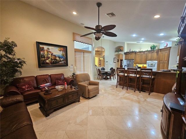 6900 Molakai Cir, Boynton Beach, FL 33437 - living area featuring a ceiling fan, recessed lighting, and light marble finish floors