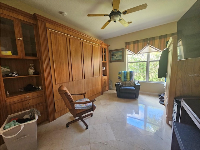 6900 Molakai Cir, Boynton Beach, FL 33437 - sitting room featuring a ceiling fan and light marble finish floors
