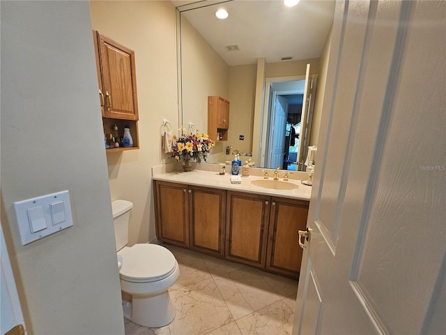 6900 Molakai Cir, Boynton Beach, FL 33437 - bathroom featuring double vanity, marble look tiles, and recessed lighting