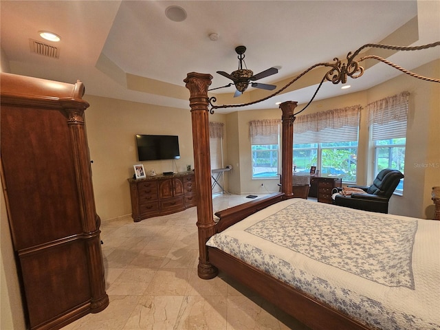 6900 Molakai Cir, Boynton Beach, FL 33437 - bedroom featuring multiple windows and a raised ceiling