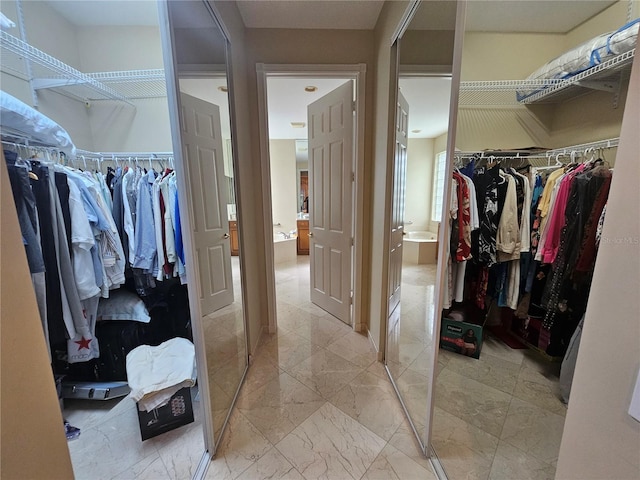 6900 Molakai Cir, Boynton Beach, FL 33437 - walk in closet with light marble finish flooring