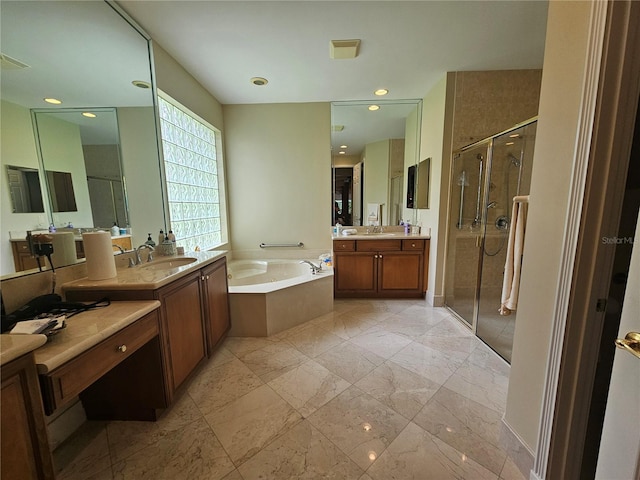 6900 Molakai Cir, Boynton Beach, FL 33437 - full bath featuring a shower stall, a garden tub, two vanities, marble look tile flooring, and recessed lighting