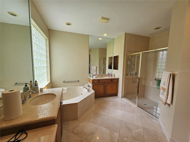 6900 Molakai Cir, Boynton Beach, FL 33437 - bathroom with a stall shower, a jetted tub, two vanities, marble look tile flooring, and recessed lighting