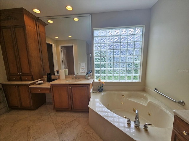 6900 Molakai Cir, Boynton Beach, FL 33437 - bathroom featuring vanity, a whirlpool tub, and recessed lighting
