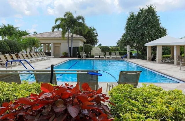 6900 Molakai Cir, Boynton Beach, FL 33437 - community pool featuring a gazebo and a patio