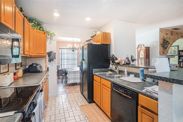 750 Caliente Dr, Brandon, FL 33511 - kitchen featuring black appliances, a chandelier, and dark countertops