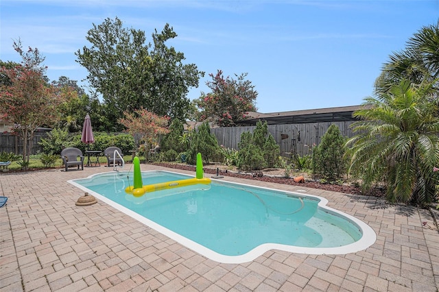 750 Caliente Dr, Brandon, FL 33511 - view of swimming pool featuring a fenced backyard and a patio