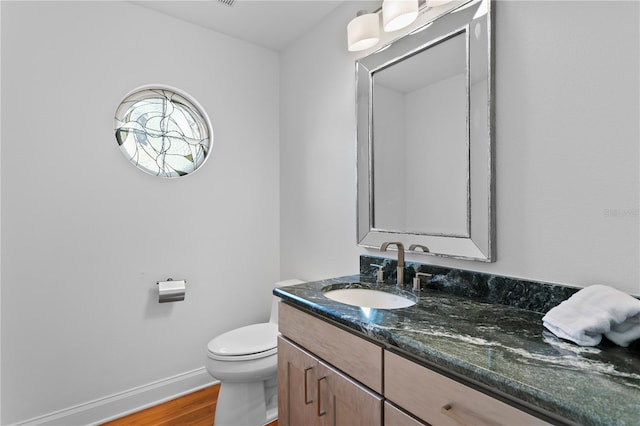 305 Sea Island Way, Tampa, FL 33602 - bathroom with vanity and wood finished floors
