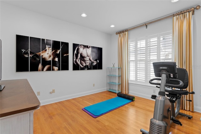 305 Sea Island Way, Tampa, FL 33602 - workout area with wood finished floors and recessed lighting