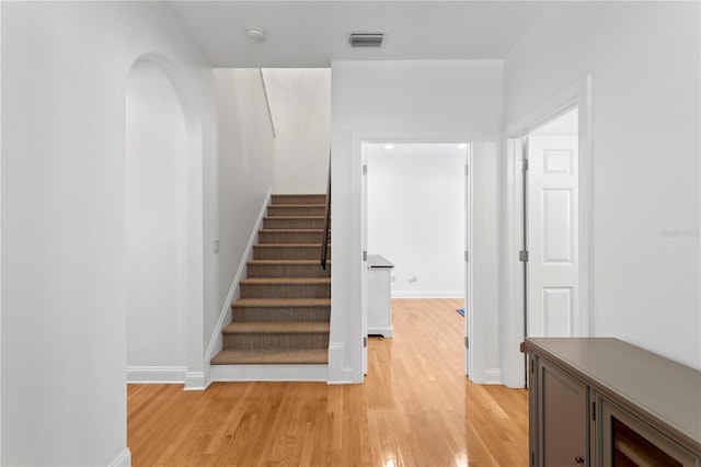 305 Sea Island Way, Tampa, FL 33602 - stairs featuring wood finished floors and arched walkways