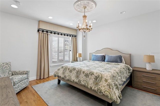 305 Sea Island Way, Tampa, FL 33602 - bedroom featuring a chandelier, wood finished floors, and recessed lighting