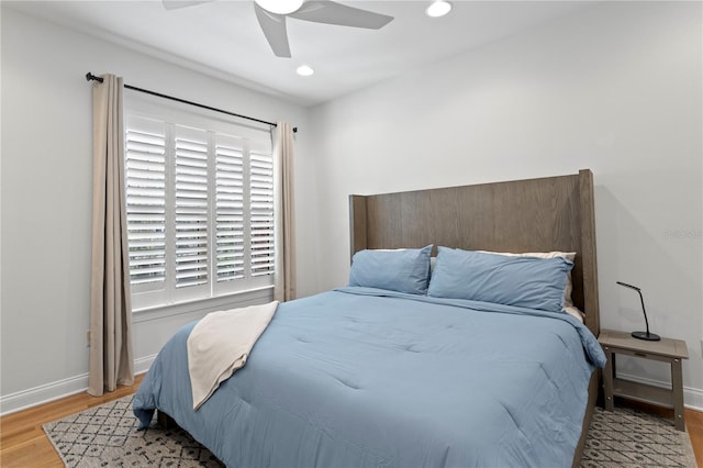 305 Sea Island Way, Tampa, FL 33602 - bedroom with wood finished floors, ceiling fan, and recessed lighting