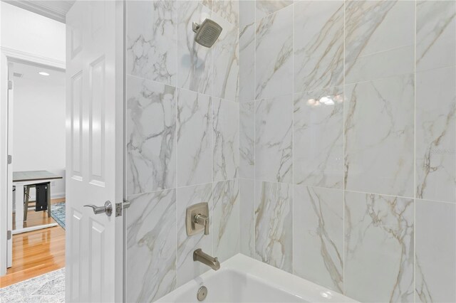 305 Sea Island Way, Tampa, FL 33602 - full bathroom featuring shower / bathtub combination and wood finished floors