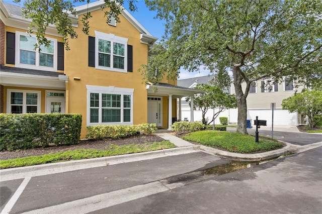 305 Sea Island Way, Tampa, FL 33602 - view of front of home featuring stucco siding