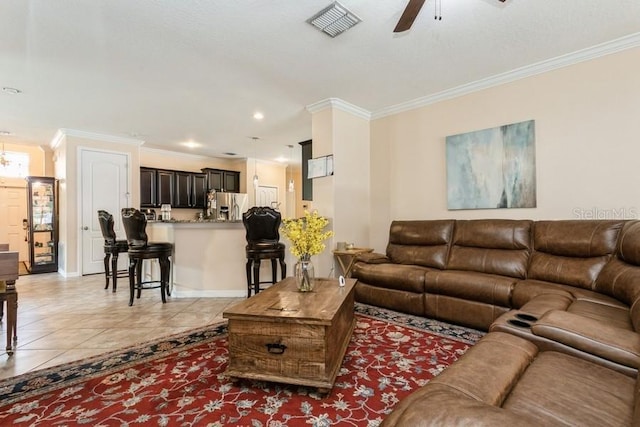 2639 Yukon Cliff Dr, Ruskin, FL 33570 - living room with ceiling fan, crown molding, light tile patterned flooring, and recessed lighting