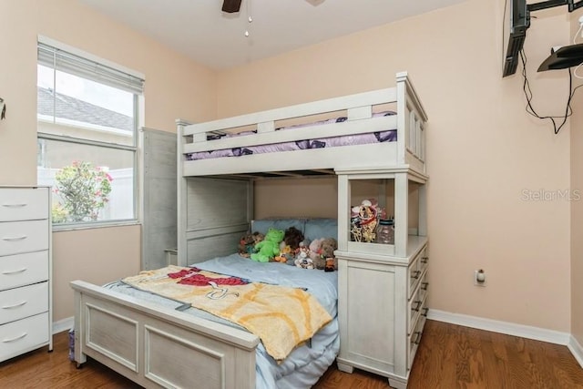 2639 Yukon Cliff Dr, Ruskin, FL 33570 - bedroom featuring wood finished floors and a ceiling fan