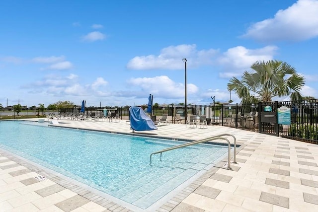 2639 Yukon Cliff Dr, Ruskin, FL 33570 - community pool featuring a patio