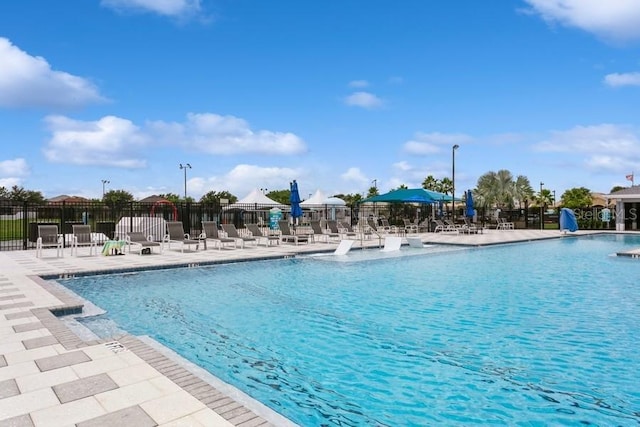 2639 Yukon Cliff Dr, Ruskin, FL 33570 - community pool featuring a patio area