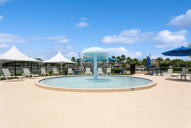 2639 Yukon Cliff Dr, Ruskin, FL 33570 - community pool featuring a patio