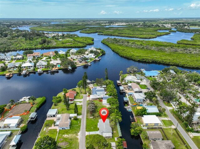 106 W N Branch Rd, Ruskin, FL 33570 - aerial view of property and surrounding area featuring a large body of water and nearby suburban area