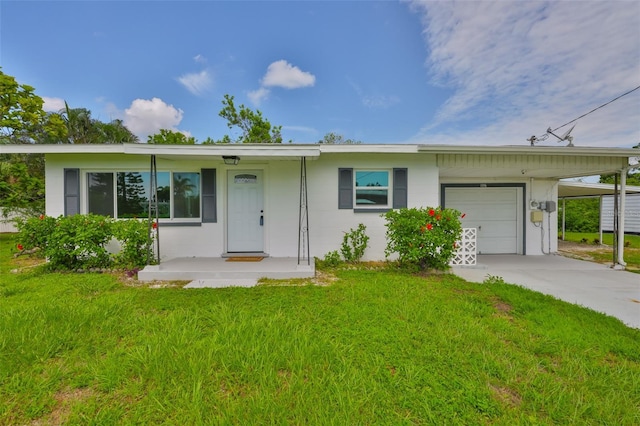 106 W N Branch Rd, Ruskin, FL 33570 - single story home featuring a garage, a front yard, and driveway