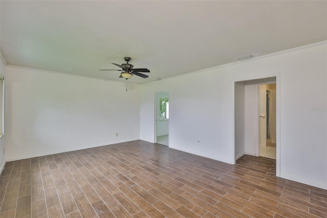 106 W N Branch Rd, Ruskin, FL 33570 - empty room featuring a ceiling fan, crown molding, and wood finished floors