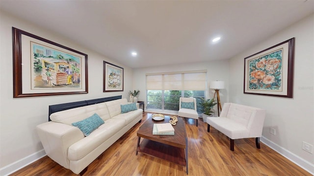 14424 Neptune Rd, Seminole, FL 33776 - living room with wood finished floors and recessed lighting