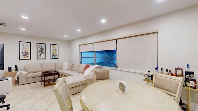 14424 Neptune Rd, Seminole, FL 33776 - living area with recessed lighting and light tile patterned floors
