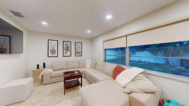 14424 Neptune Rd, Seminole, FL 33776 - living area featuring tile patterned flooring and recessed lighting