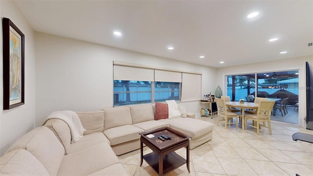 14424 Neptune Rd, Seminole, FL 33776 - living area featuring recessed lighting and light tile patterned flooring