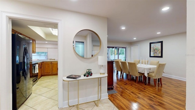 14424 Neptune Rd, Seminole, FL 33776 - dining space with recessed lighting and light wood-style floors