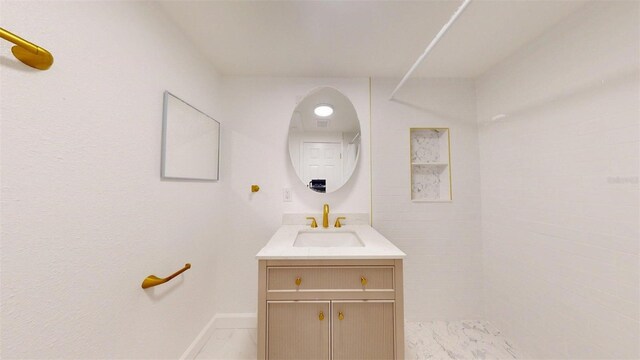 1431 Island Dr S, South Pasadena, FL 33707 - bathroom with vanity and baseboards